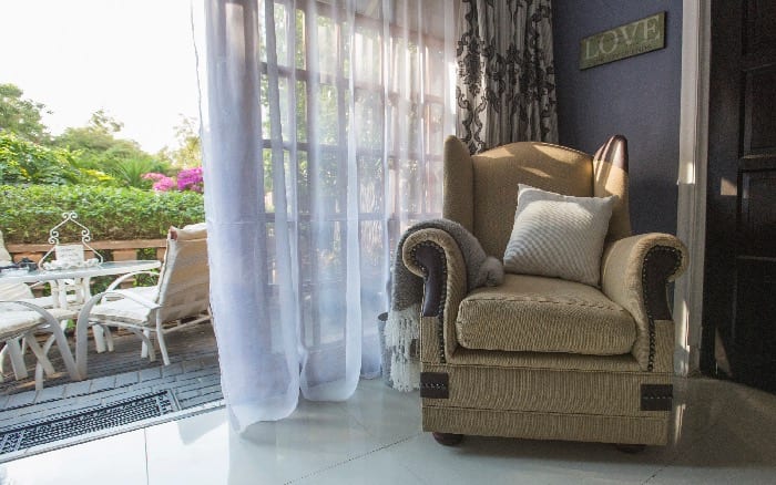 Armchair and seating area in a guest room