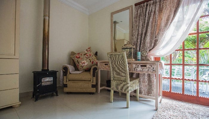 Guest room with fireplace and seating
