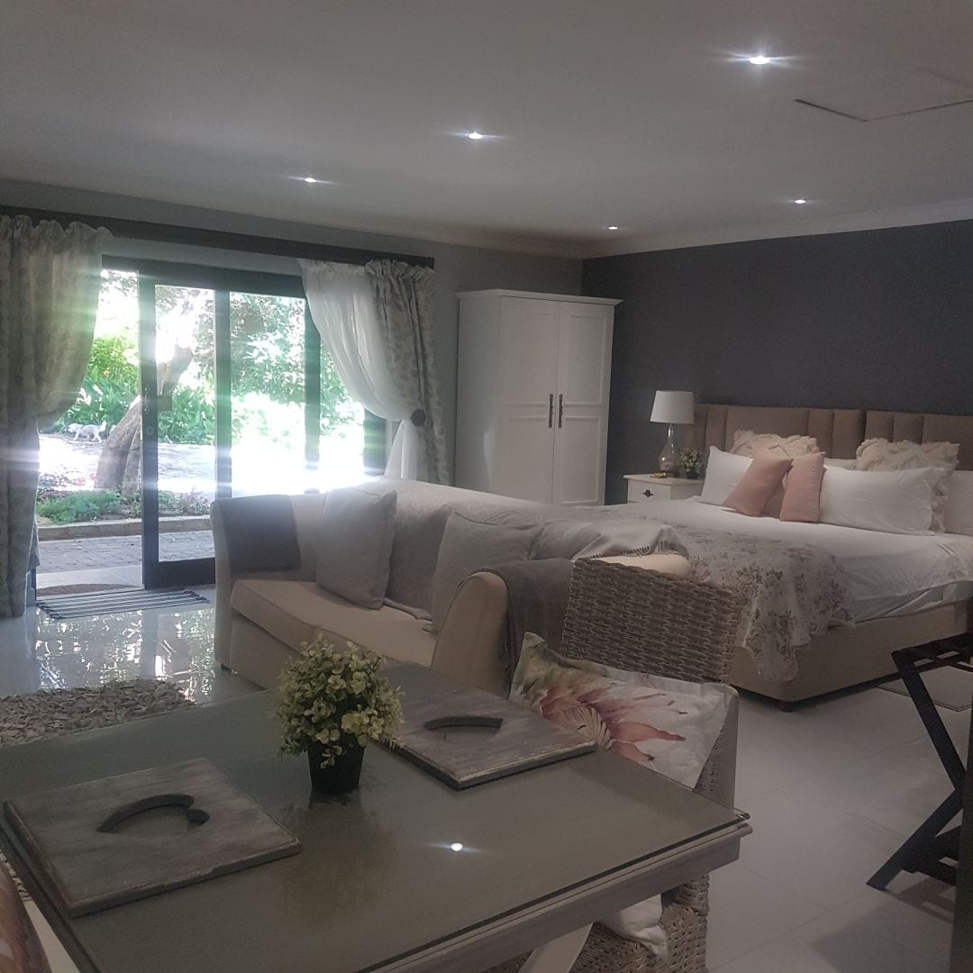Bright guest suite with seating