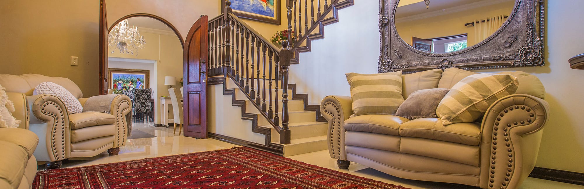 Lounge with staircase at Meraki Country Manor